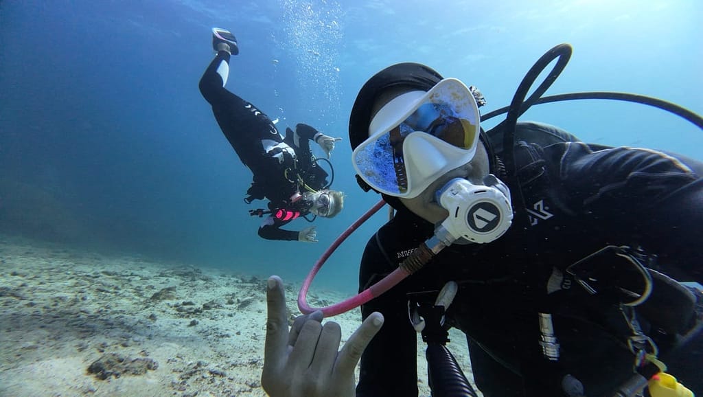 phi-phi-cabana-diving-try-scuba-diving-17 A scuba diving instructor making a selfie and another diver on the background super happy with the experience